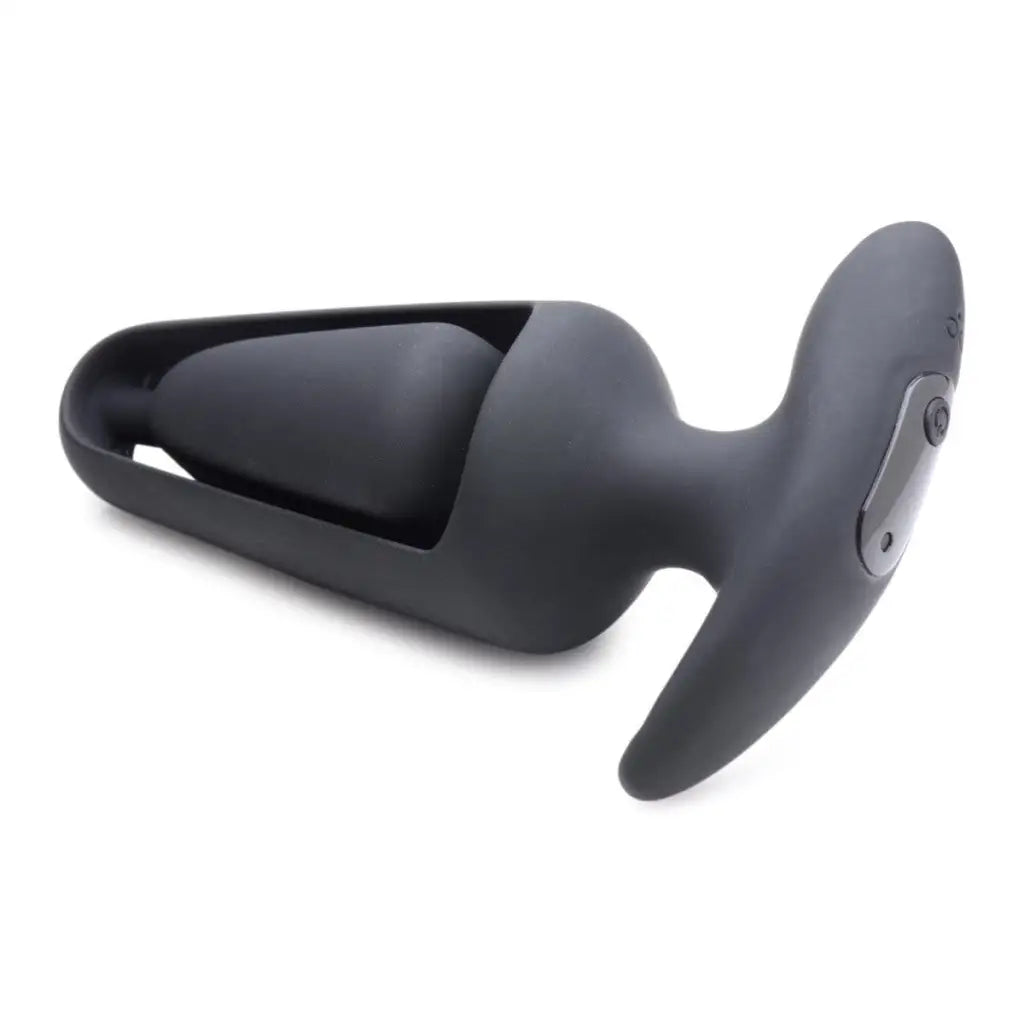 Ass Thumpers Power Plug 7X: Matte black silicone anal plug with hollow design and remote control