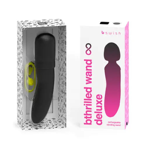 Close-up of B Swish Bthrilled Premium Mini Wand Noir with black and yellow vibrating device
