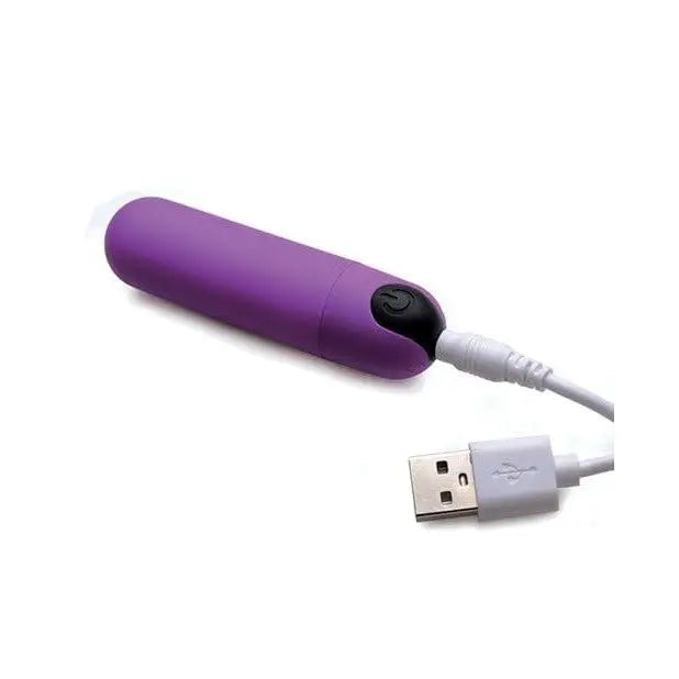 Purple cylindrical vibrating bullet with remote control and USB charging cable, body safe silicone