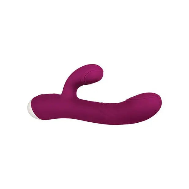 A pair of purple gloves with the Evolved Double Tap Thumping Rabbit Vibrator in the background