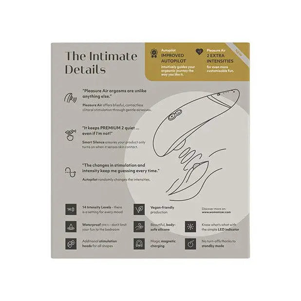 Close up of scissors package and signed photo with Womanizer PREMIUM 2 Premium Air Stimulator