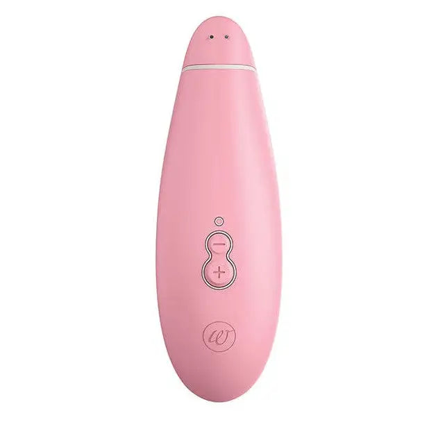Womanizer PREMIUM Eco Air Clitoral Stimulator with pink breast pump on white background