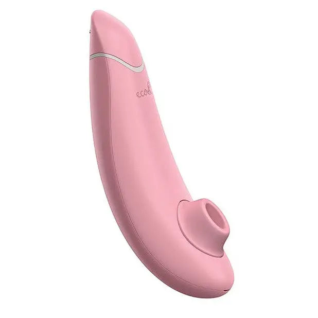 Close-up of Womanizer PREMIUM Eco pink device against a white background