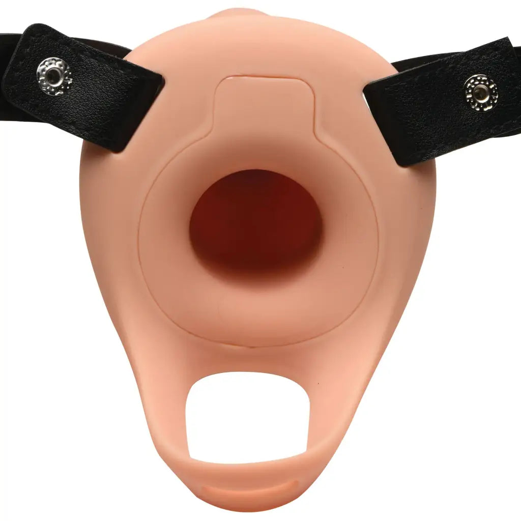 Silicone penis sheath: Pink pig shaped with black straps and remote for vibration control