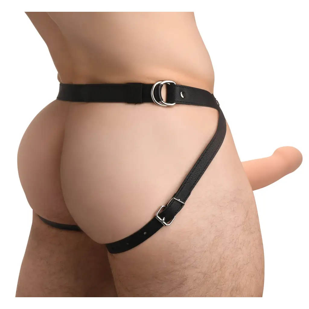 Man with black leather belt showcasing 2-inch vibrant silicone penis sheath with remote