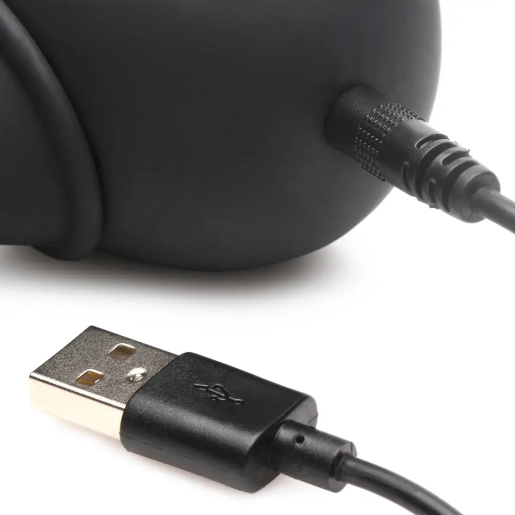 Close-up of black headphone with USB cable from the 28x Vibrating Balls product