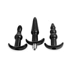 4 Piece Vibrating Anal Plug Set featuring three black plugs of various shapes and sizes