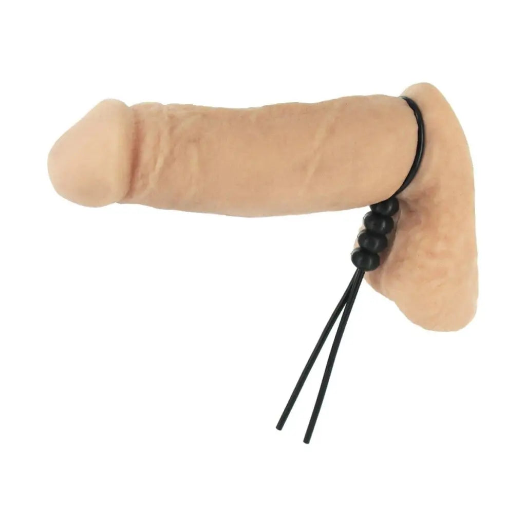 Adult novelty adjustable cock and ball tie black with male anatomy and stimulation accessory