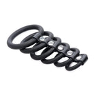 Black rubber ring with three rings from the 6 Ring Silicone Chastity Device set