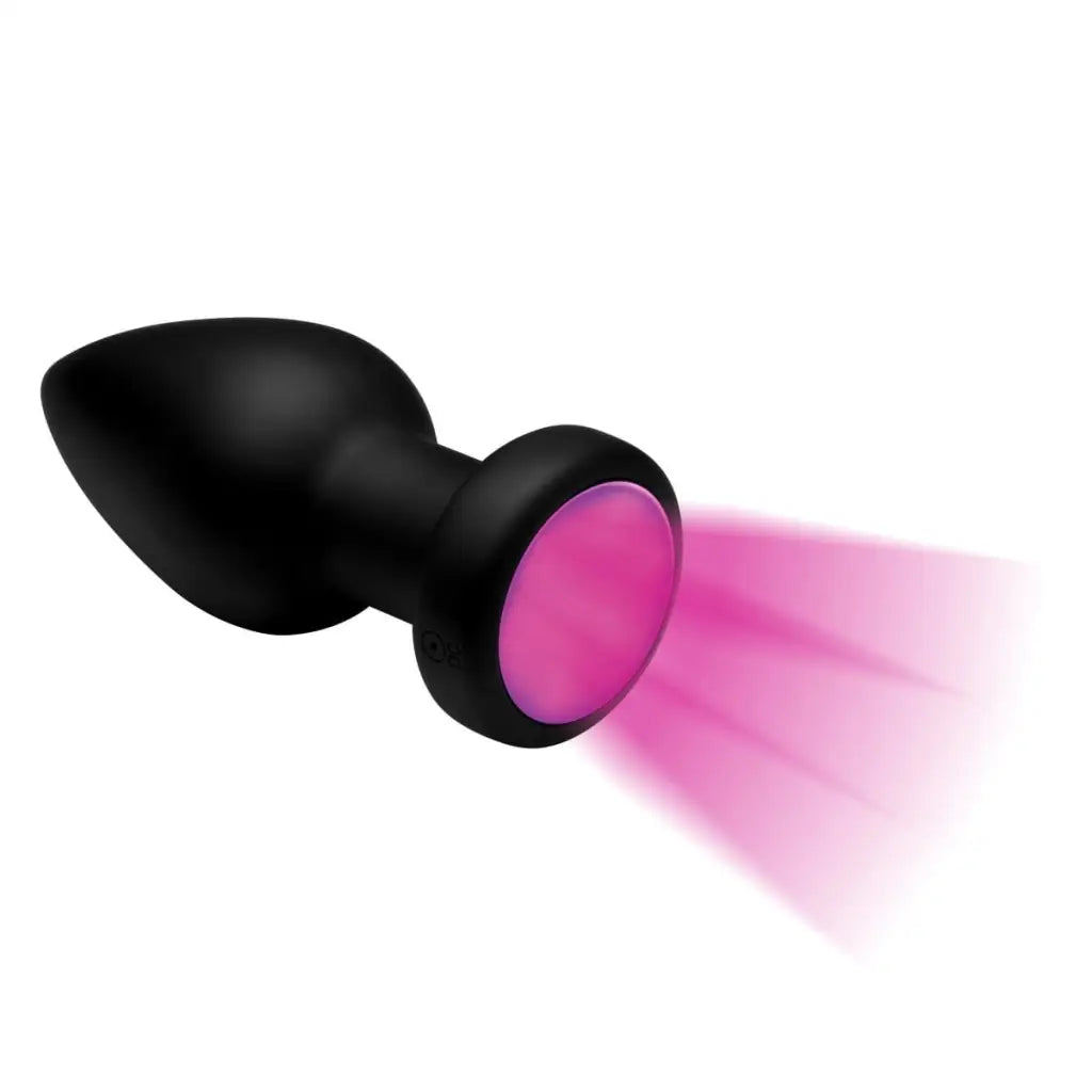 Rechargeable anal plug: Black silicone with pink glowing end from Booty Sparks 7x Light Up