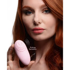 Pink Pulsing Silicone Clit Stimulator with ’Pulsing Sensation’ text