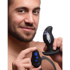 Man smiling with 8x Volt Drop Vibrating E-stim Silicone Prostate Massager and remote control