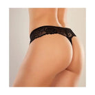 A woman wearing an Adore ’Chiqui Love’ crotchless thong with black lace detailing