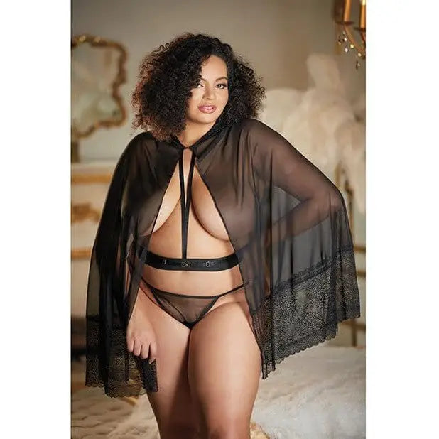 Woman in revealing black lingerie & sheer mesh cape with allure lace attached waist belt