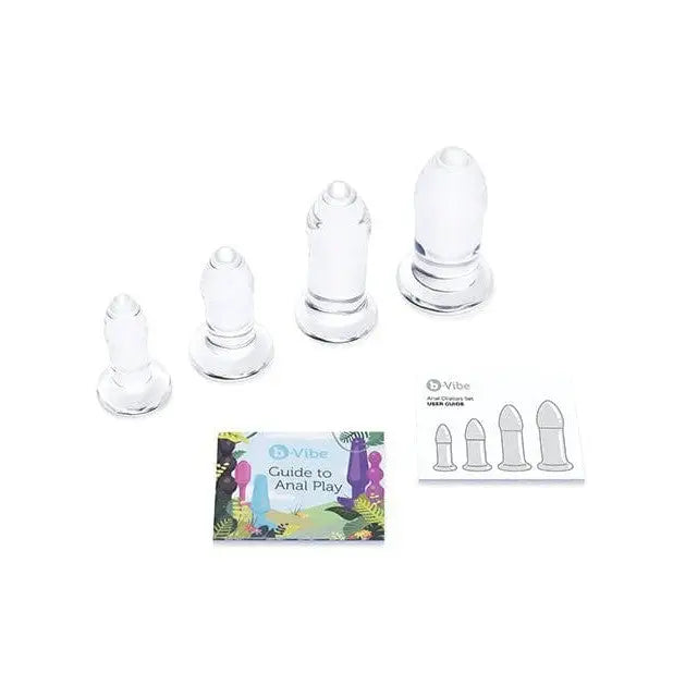 b-Vibe Glass Anal Dilator Set with white baby bottle and small plastic cups