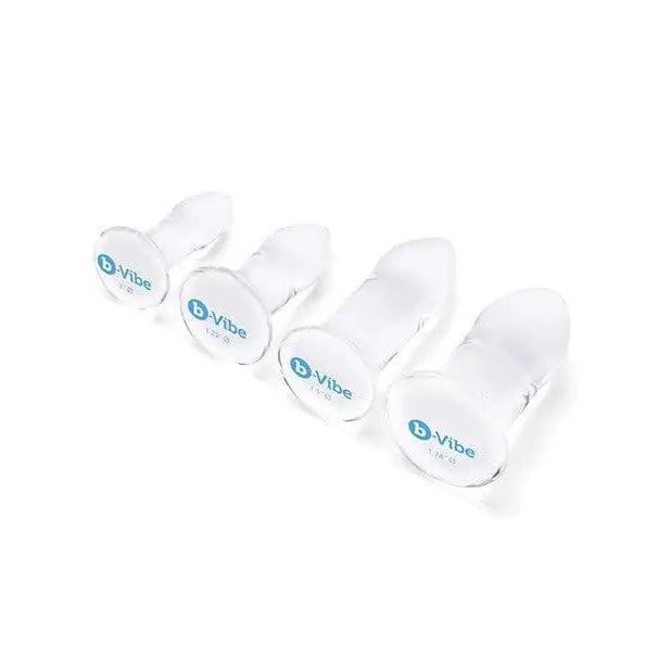 Three pairs of vie slippers from the b-Vibe Glass Anal Dilator 4 Piece Set