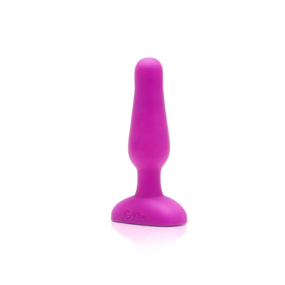 Purple b-Vibe Novice Plug for anal play on a white background