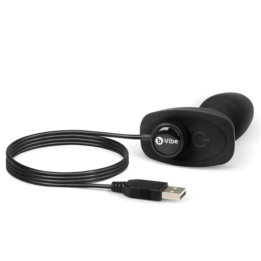 USB cable connected to b-Vibe Petite Rimming Plug for easy charging