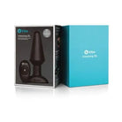 Close-up of b-Vibe Rimming Plug XL with wireless remote in a box