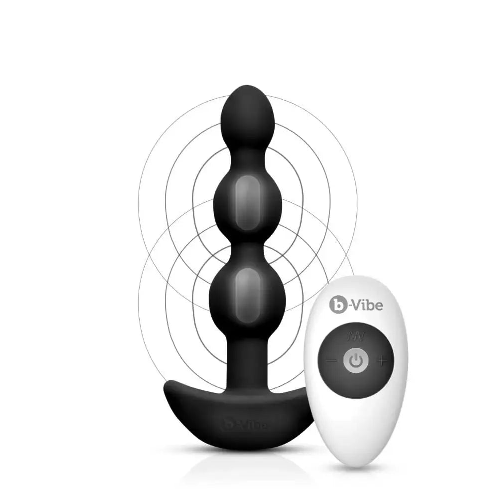 b-Vibe Triplet Anal Beads with black and white object and remote control for enhanced pleasure