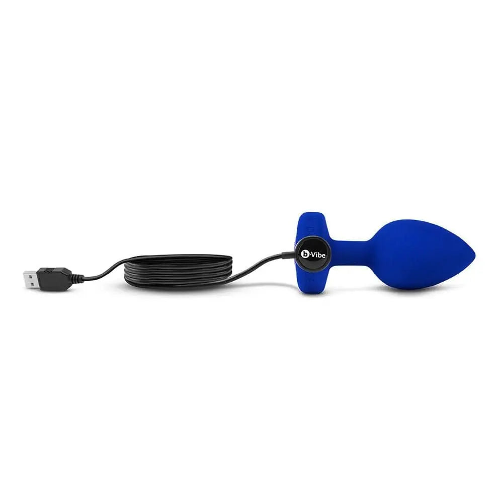 Blue vibrating jewel plug with black cord from b-Vibe for discreet pleasure