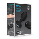 Close-up of b-Vibe Vibrating Jewel Plug in a box, showcasing its sleek black design