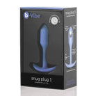 b-Vibe Weighted Snug Plug 1: blue silicon vibrating device with smooth grip handle