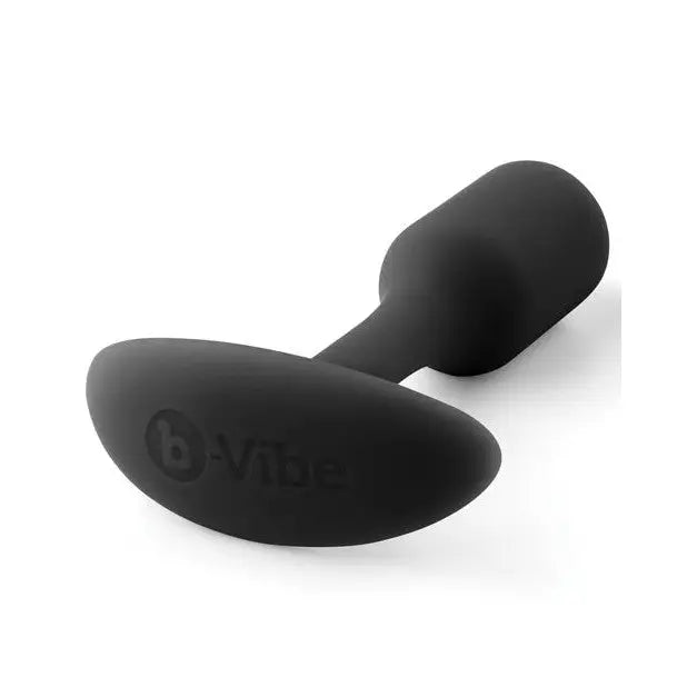 Close-up of b-Vibe Weighted Snug Plug 1 with smooth grip handle against white background