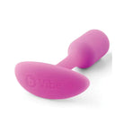 Pink silicone vibrating snug plug with a smooth grip handle by b-Vibe, 55 grams