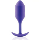 Purple silicone weighted snug plug with curved tail - b-Vibe Weighted Snug Plug 2, 114 grams