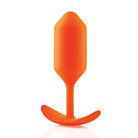 Orange plastic spoon handle, part of the b-Vibe Weighted Snug Plug 3 - 180 Grams product