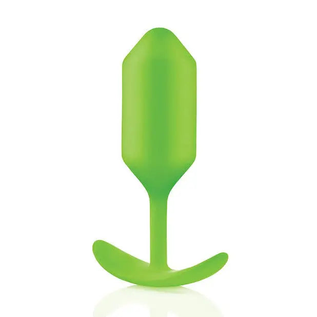 Green plastic spoon handle included with the b-Vibe Weighted Snug Plug 3 - 180 grams