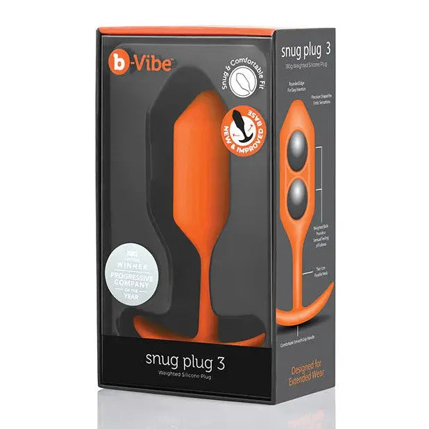 Close-up of the b-Vibe Weighted Snug Plug 3, featuring its black and orange packaging