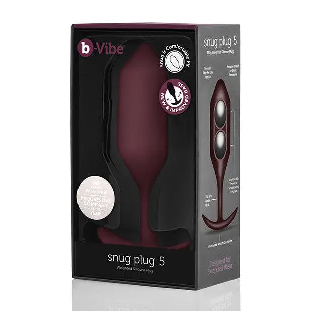 Close up of b-Vibe Weighted Snug Plug 5 (350g) box with remote control