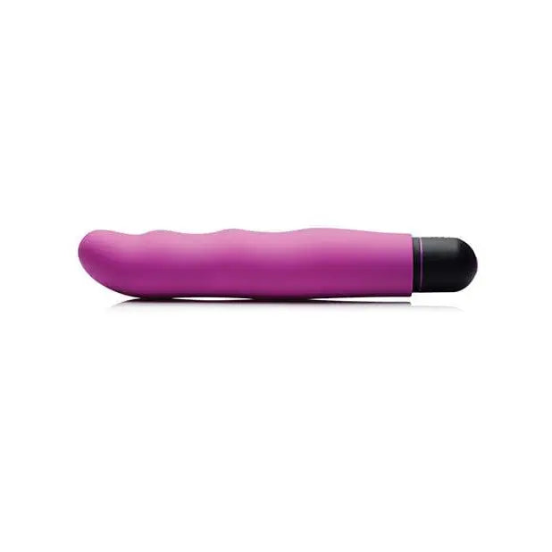 Purple vibrator with black tip from BANG! 3 Speed XL Bullet and Silicone Wavy Sleeve