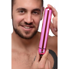 Smiling person holding a pink BANG! 3-Speed XL vibrating metallic bullet