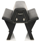 Classic design person chair with studs, attachment points, and padded cushions displayed