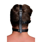 Black leather head harness with adjustable straps and black ball gag for secure restraint