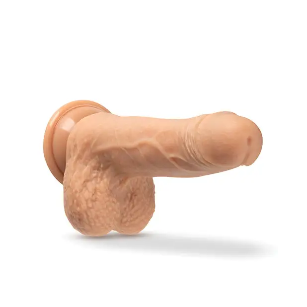 Platinum cured silicone toy with suction cup; resembles male genitalia; realistic design