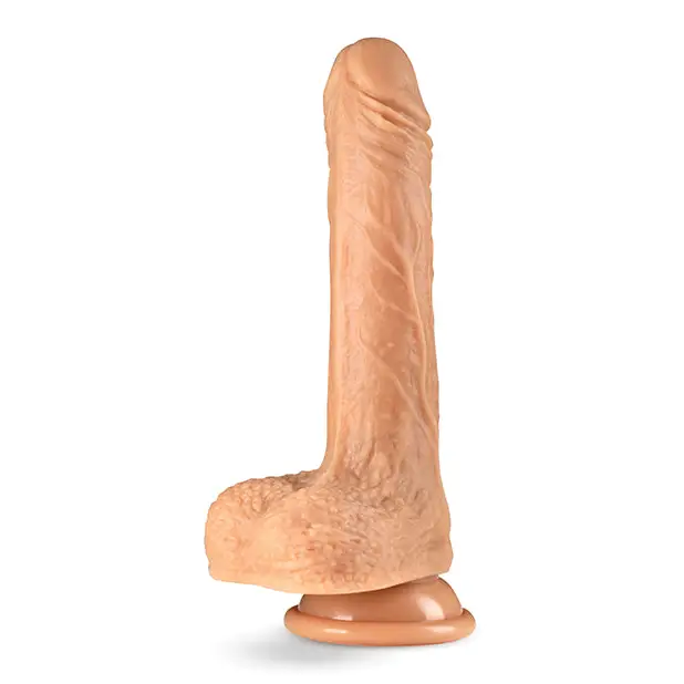 Beige silicone thumping dildo with suction cup and balls, anatomically detailed