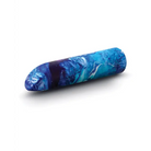 Mesmerize Power Vibe - Cylindrical object with swirling blue and turquoise wave-like patterns