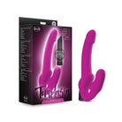 Bright pink Temptasia Estella strapless silicone dildo with a curved shape and textured surface