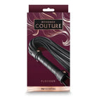 Bondage Couture Vinyl Flogger by NS Novelties in a purple box with black leather tails