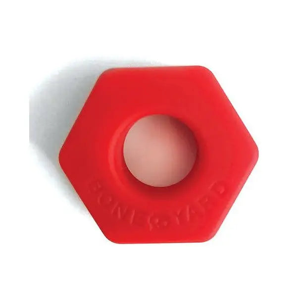 Red Boneyard Bust A Nut Cock Ring with a central hole - ultimate nut cock accessory