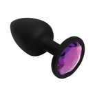 Booty Bling: Elegant black and purple glass ball with a dazzling purple stone for added allure