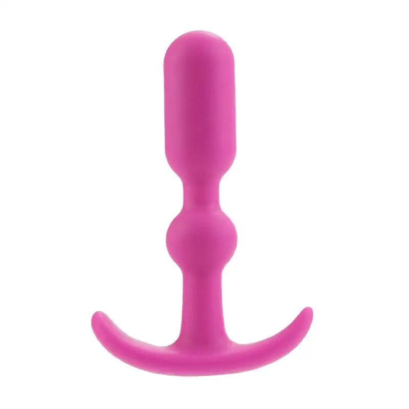 Pink silicone Booty Call Booty Teaser with a large, curved tail by California Exotic Novelties