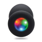 Booty Sparks Silicone Light Up Anal Plug features a colorful, illuminated circular display