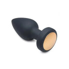 Bootysparks Silicone Vibrating LED Plug with black silicone and a flesh-colored base