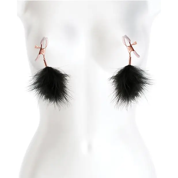 Close-up of a mannequin with Bound Nipple Clamps F1 Black earrings