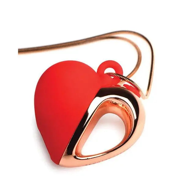 Charmed 10x vibrating silicone heart pendant in red enamel and rose gold finish